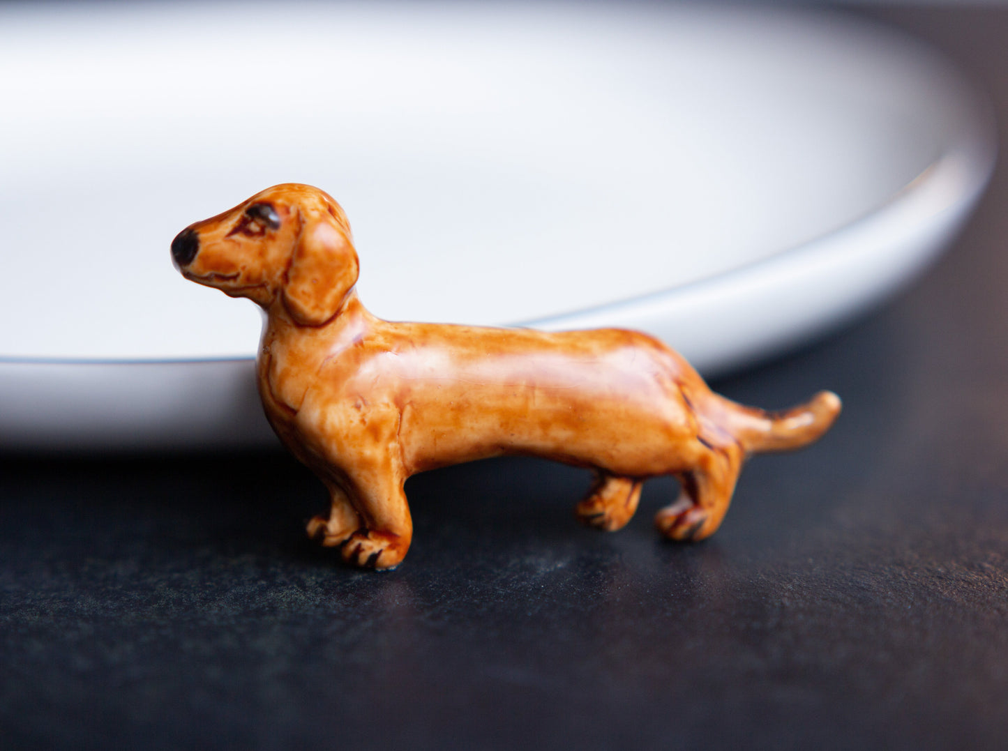 Piespraude - MELNAIS TAKSIS